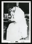 Martha Eckford using microscope