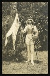 Mary Bell Smith as Joan of Arc holding banner