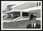 Dr. Harvey Cromwell in front of Cromwell Communications Center
