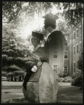 Kissing Rock draped in Cap and Gown; undated